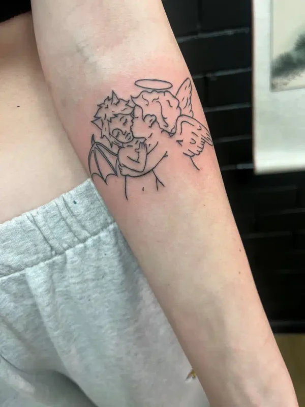 Small illustrated tattoo on a forearm